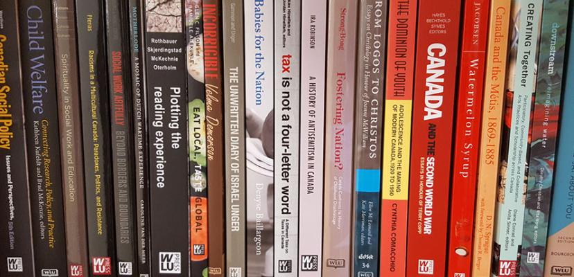 A row of book spines. The WLU Press also publishes accessible EPUB books.