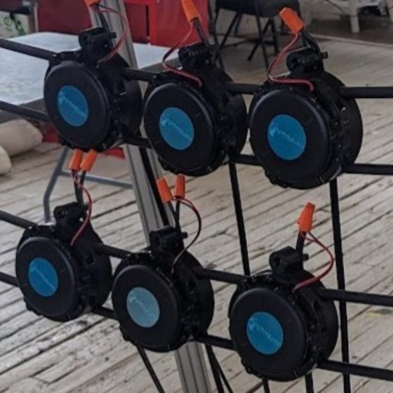 Vibrating devices on vertical mount