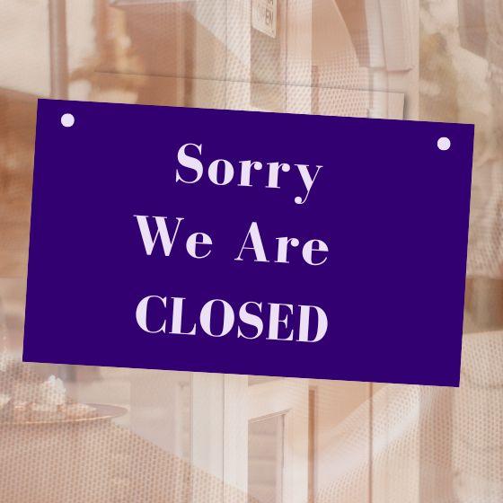sign saying sorry we are closed