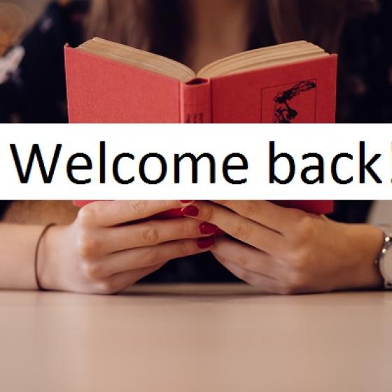 Person reading, "Welcome back"