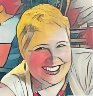 A librarian with short blonde hair. She is grinning broadly. The photo has been altered with AI to appear in a Cubism style.
