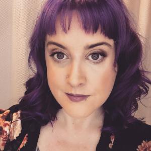 Selfie of Michelle Goodridge who has purple hair